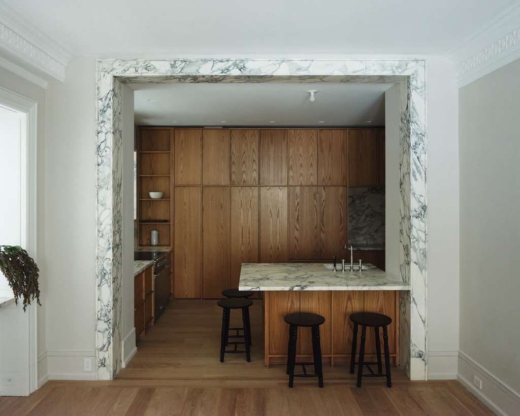 Central Park West apartment — marble-framed kitchen