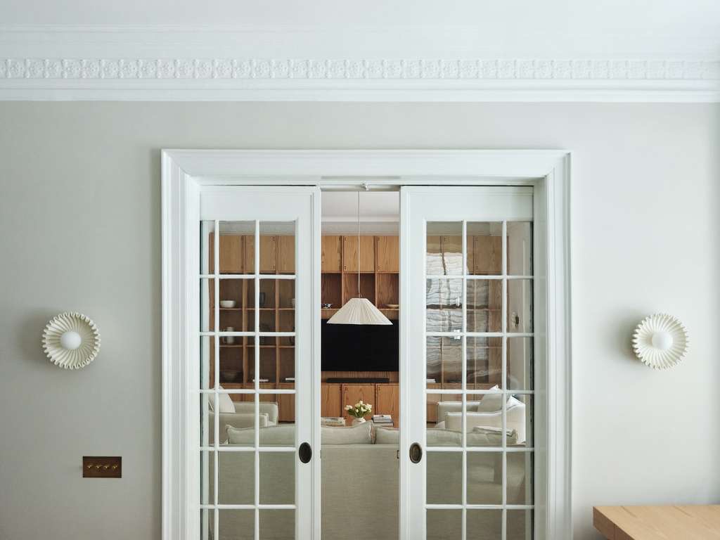 Glazed pocket doors opening to the library