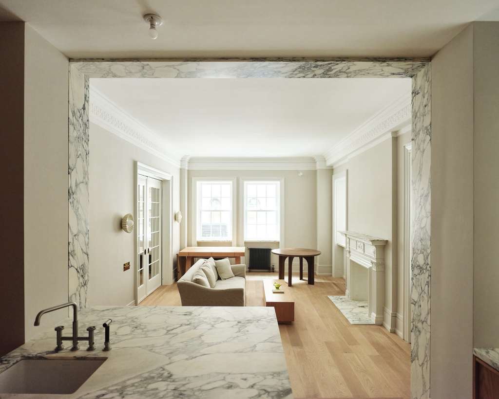 Central Park West apartment — kitchen open to the living room